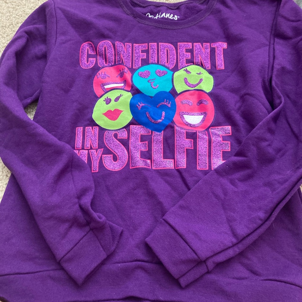 This is a nice purple sweater for kids